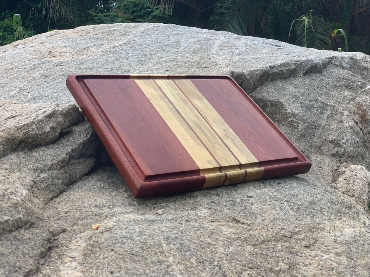 Two-tone hardwood serving board by Tuak WoodLab